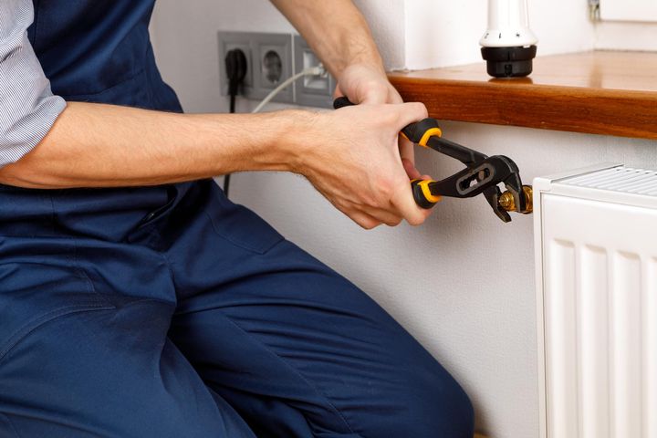 Column radiator installed during system upgrade in a Knighton home